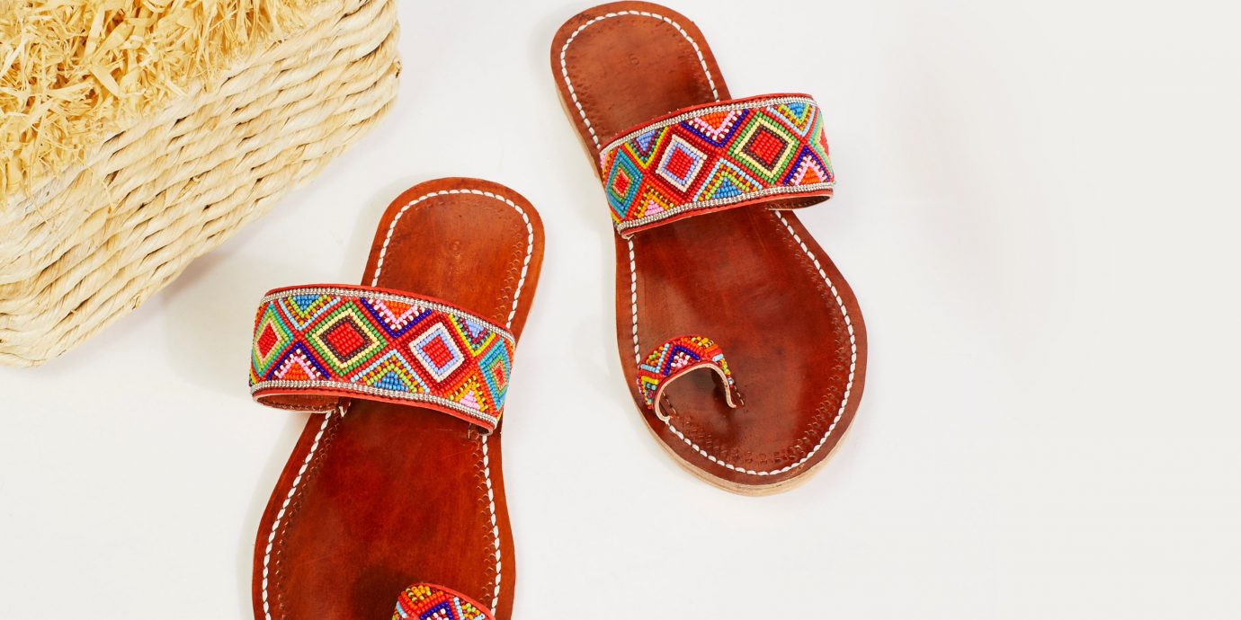 Hotels Style + Design Trip Ideas footwear shoe cloth sandal slipper outdoor shoe product flip flops font