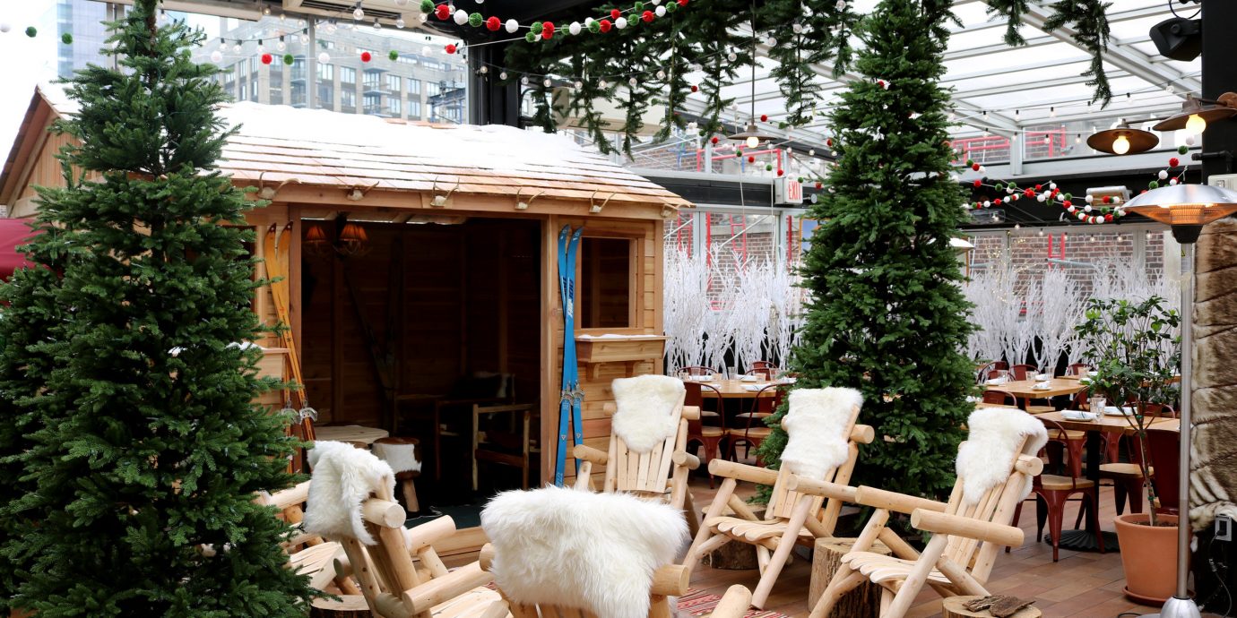 Food + Drink tree outdoor christmas decoration Christmas meal Resort home wooden restaurant interior design furniture
