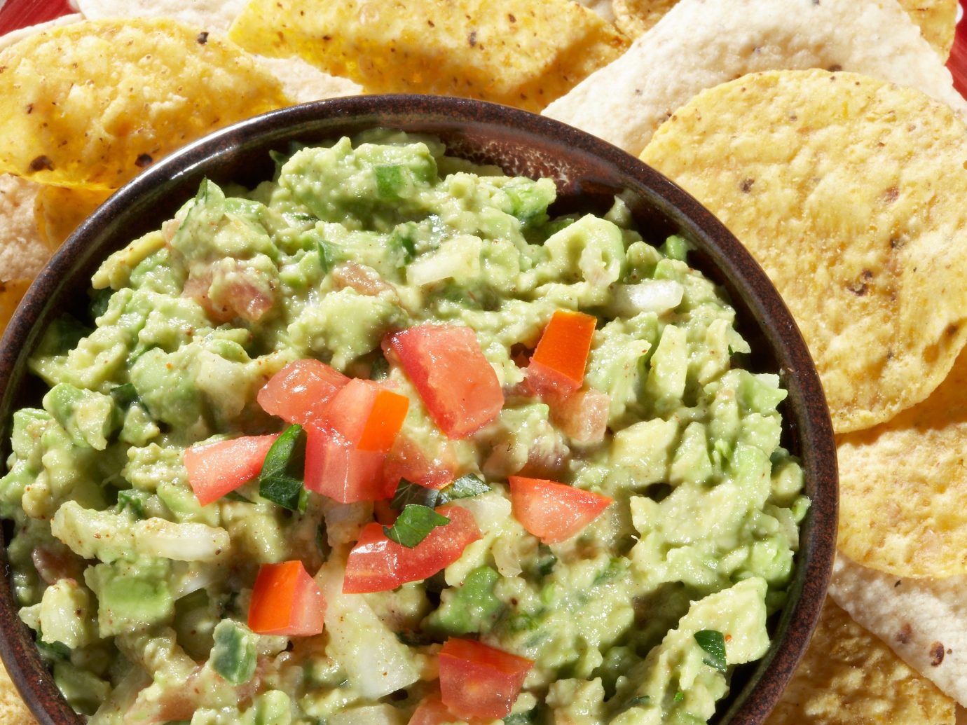 Food + Drink Trip Ideas food dish chip cuisine tostada guacamole vegetable dip rice snack food produce meal vegetarian food breakfast condiment different containing several variety