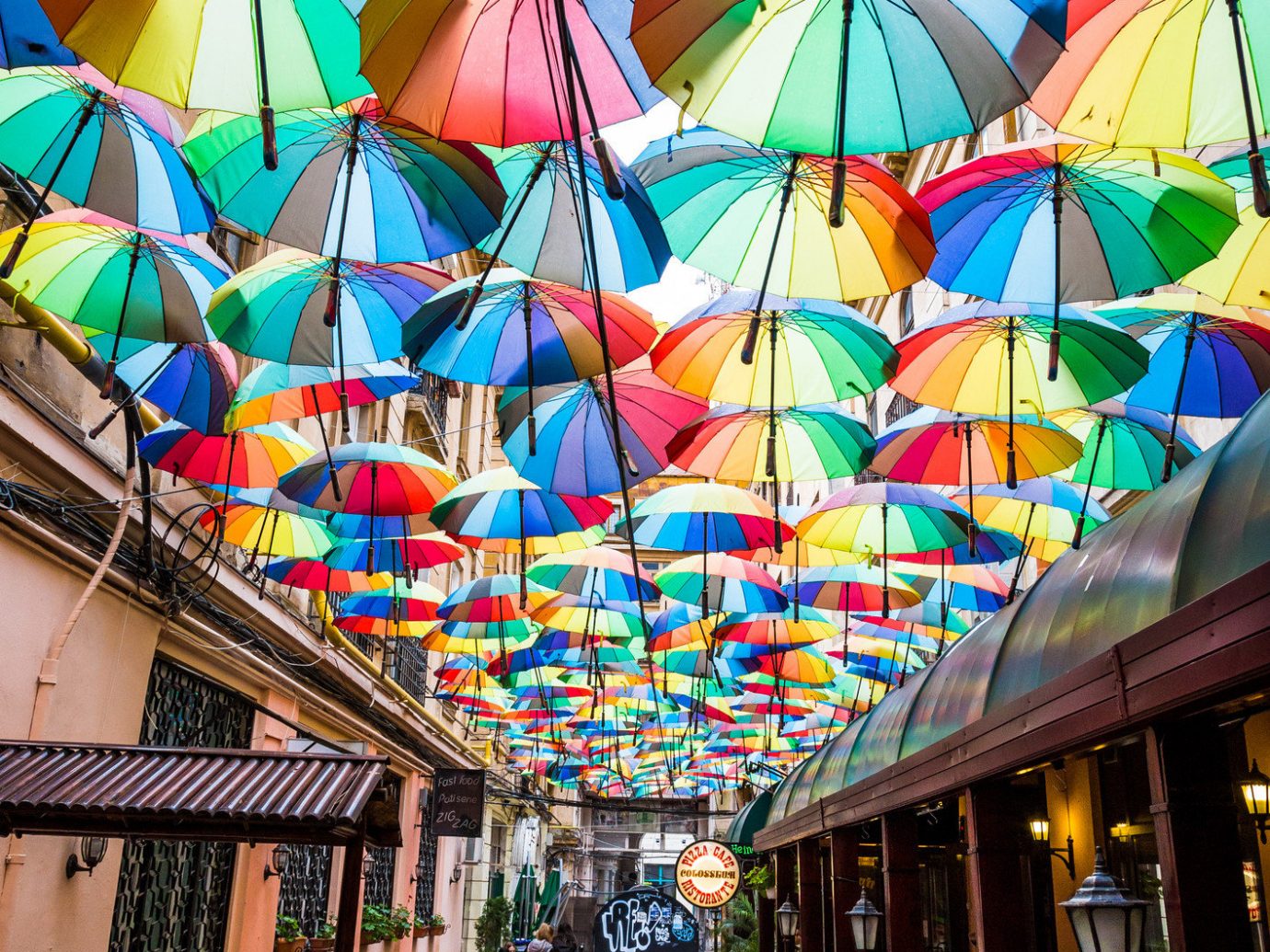 Travel Tips Trip Ideas umbrella accessory color rain outdoor colorful window art glass colored symmetry lined
