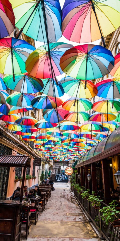 Travel Tips Trip Ideas umbrella accessory color rain outdoor colorful window art glass colored symmetry lined
