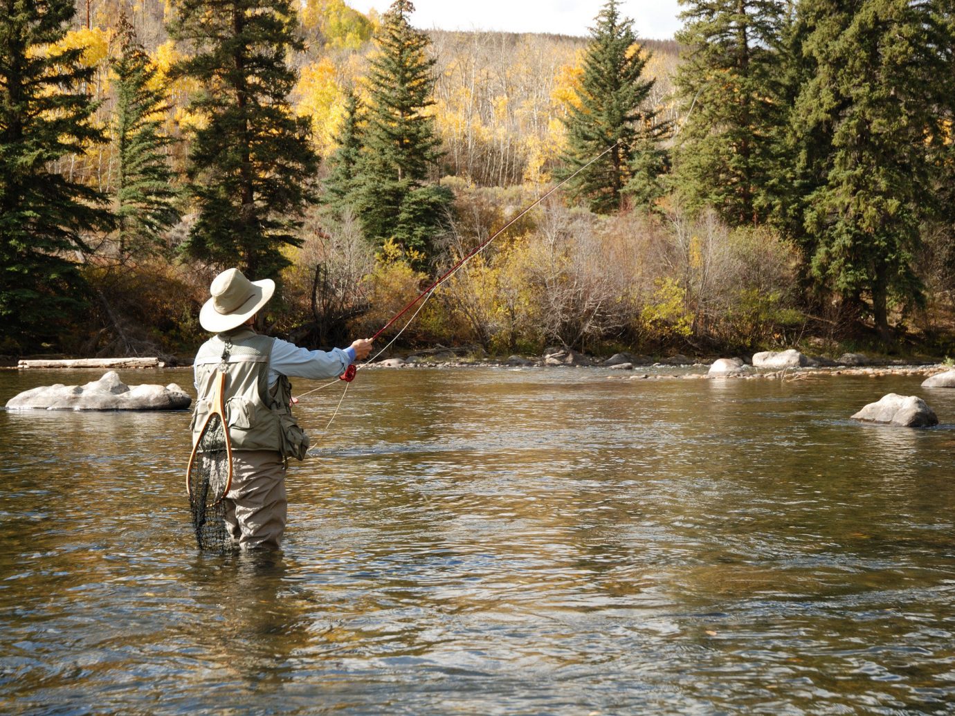 Mountains + Skiing Outdoors + Adventure tree outdoor water River recreational fishing stream Sport watercourse creek fly fishing bank water resources recreation Lake plant fishing landscape