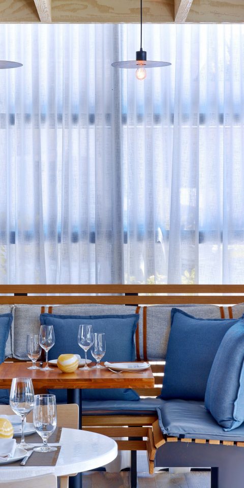 table indoor room interior design window covering curtain window treatment window blind furniture window textile colored