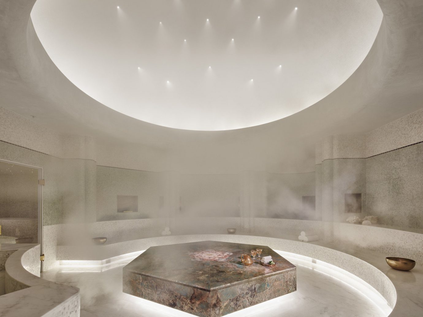 ambient lighting chic clean Health + Wellness Hotels Luxury marble private relaxation sauna Spa Spa Retreats steam room white indoor wall ceiling room floor daylighting bathtub lighting plumbing fixture bathroom swimming pool interior design shape Design jacuzzi table porcelain
