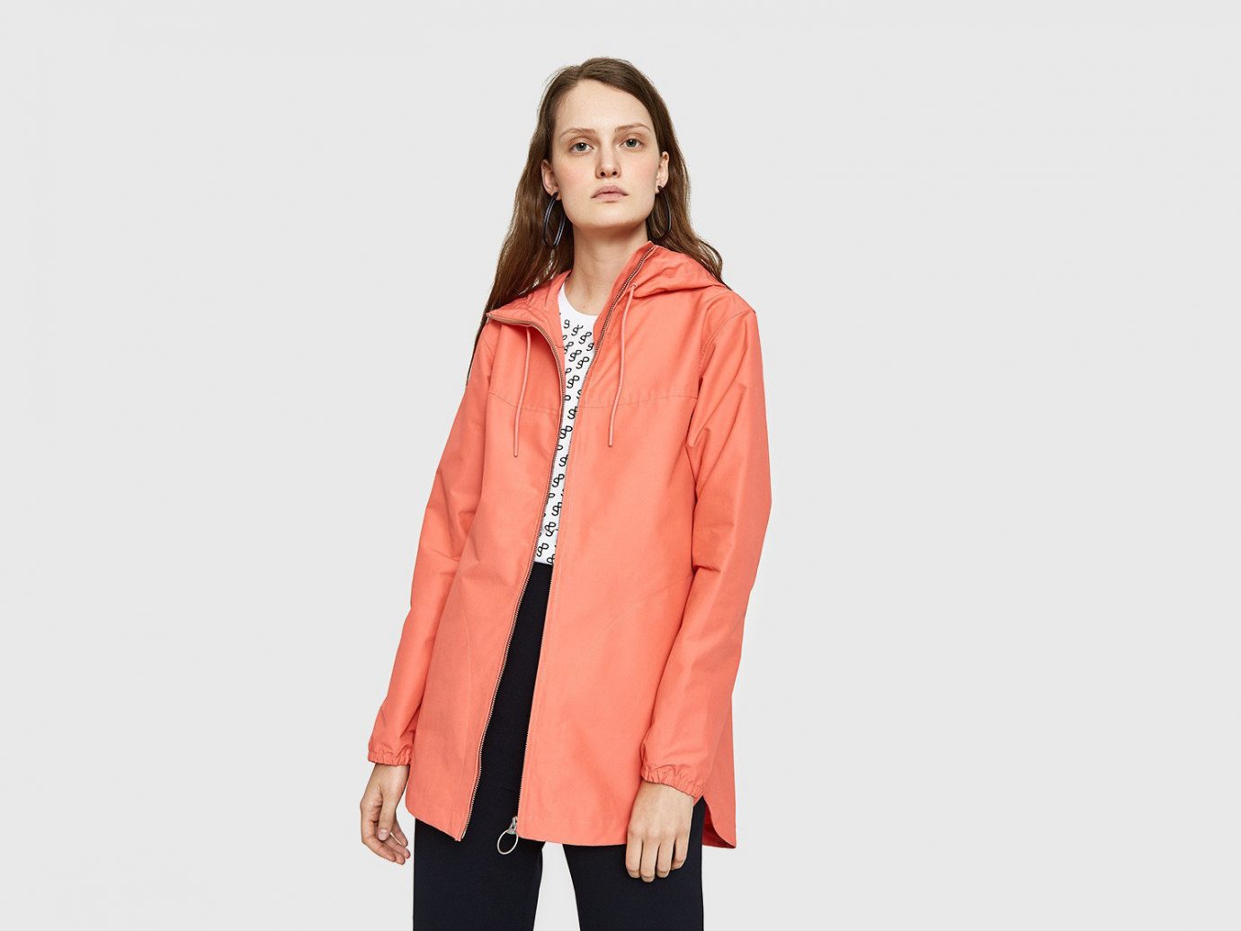 Packing Tips Spring Travel Style + Design Travel Shop clothing suit wearing posing jacket coat shoulder outerwear sleeve peach fashion model dressed neck hood