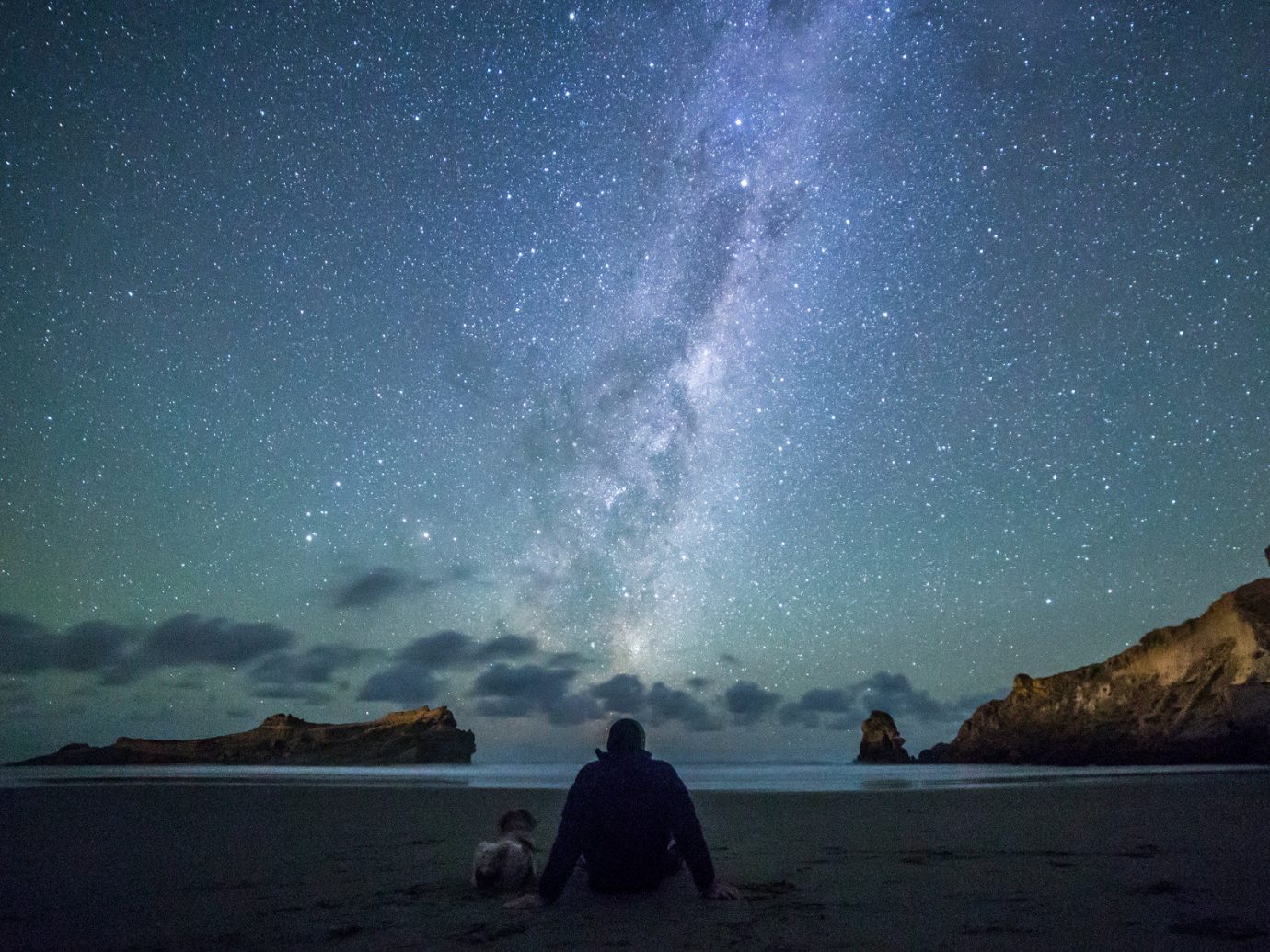 Beach calm isolation majestic Nature night Night Sky northern lights Ocean Oceania Outdoors people remote Rocks Scenic views serene silhouette star gazing stars Travel Tips Trip Ideas water outdoor sky galaxy astronomical object star astronomy Sea moonlight milky way