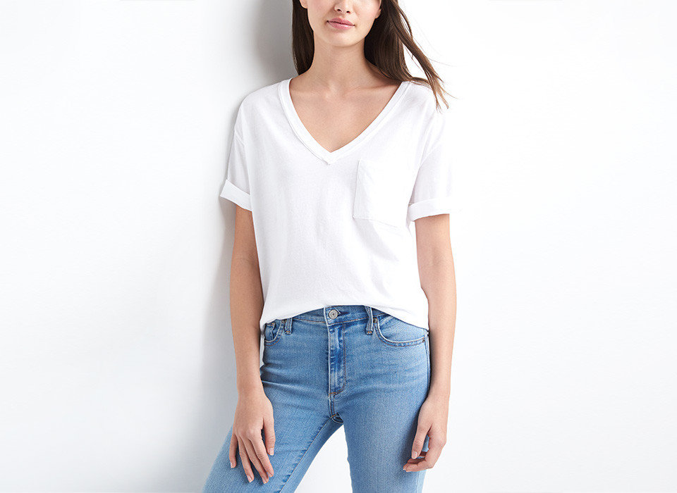 Travel Tips person clothing white sleeve neck standing shoulder fashion model waist t shirt posing joint pocket one piece garment jeans blouse trouser