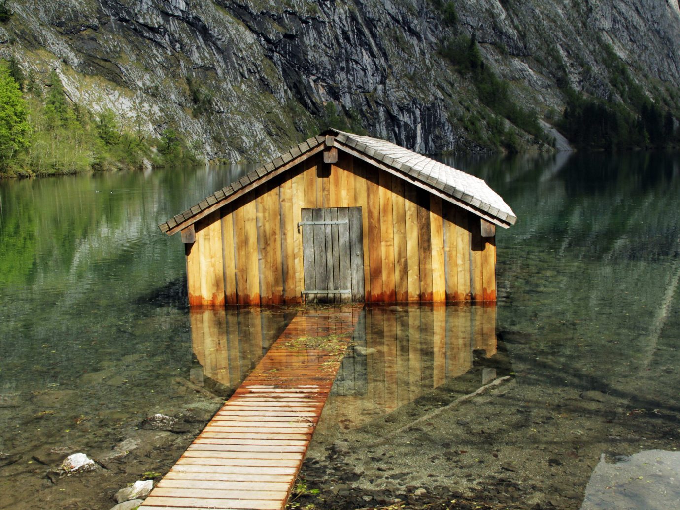 water outdoor River Lake mountain hut bridge rural area pond infrastructure reflection reservoir stone surrounded