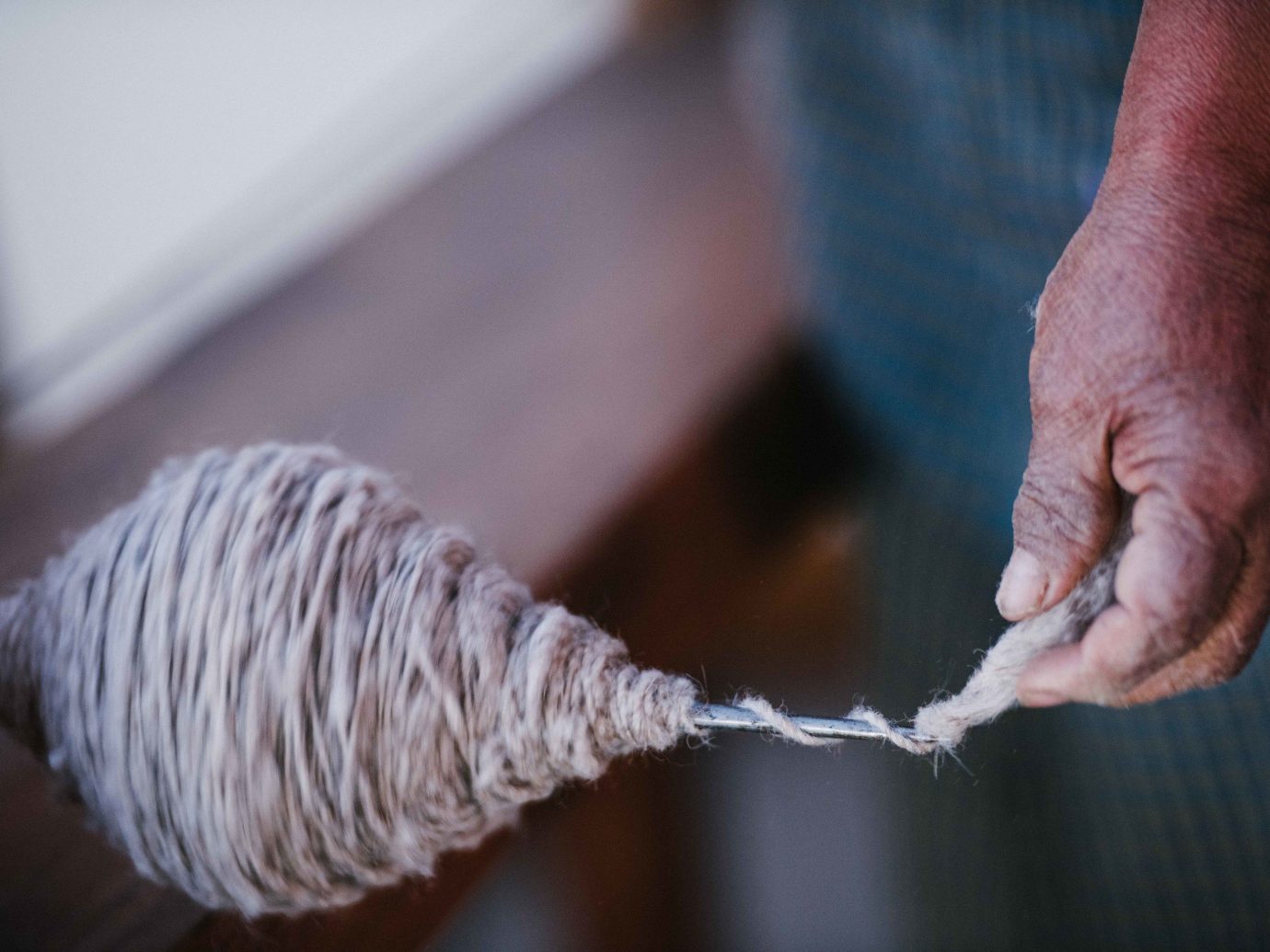 Arts + Culture Mexico Oaxaca Trip Ideas person indoor rope thread hand wool finger close feet