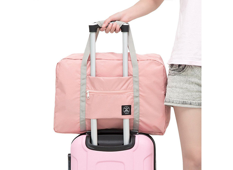 Packing Tips Travel Shop Travel Tech Travel Tips luggage person suitcase bag pink product handbag hand luggage product design case peach accessory shoulder bag baggage luggage & bags beige