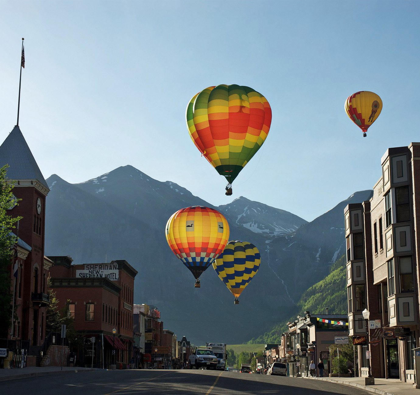 Adventure Buildings Entertainment Mountains Scenic views Town transport balloon aircraft sky Hot Air Balloon vehicle hot air ballooning atmosphere of earth toy