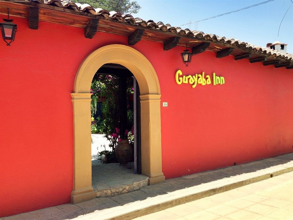 red building yellow Architecture arch hacienda painted colored