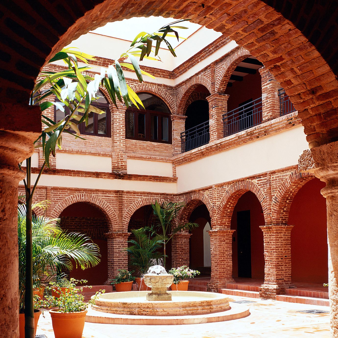 Classic Courtyard Grounds building arch Architecture hacienda stone brick home mansion palace ancient history court colonnade