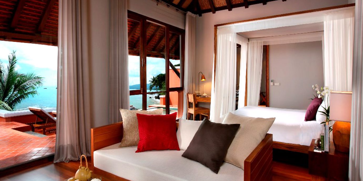 Balcony Beachfront Bedroom Cultural Jungle Resort Romantic Tropical Waterfront property living room home house Suite cottage Villa nice farmhouse flat