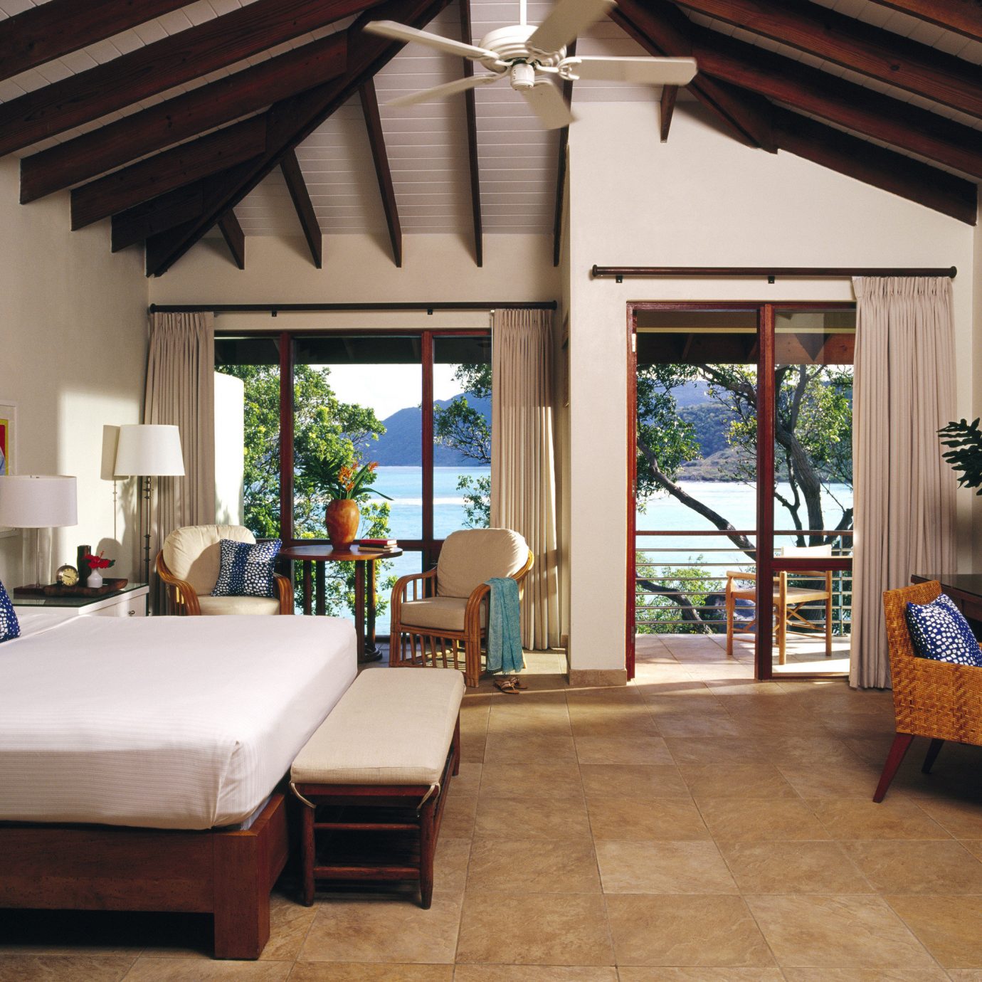 Balcony Beachfront Bedroom Elegant Island Resort Romantic Scenic views Suite Terrace Waterfront property living room house Villa home cottage porch farmhouse outdoor structure