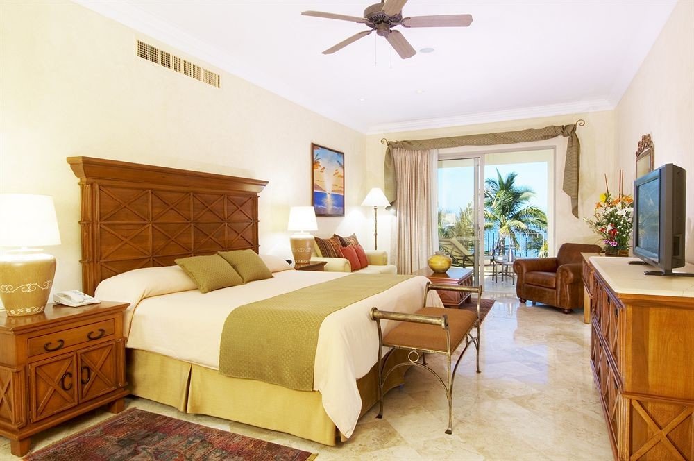 Balcony Beachfront Bedroom Scenic views Tropical property Suite cottage home hardwood Villa living room