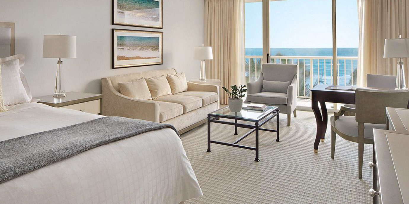 Balcony Bedroom Elegant Lounge Luxury Scenic views Suite chair property condominium living room home cottage nice Villa
