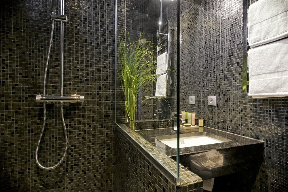bathroom house brick tiled tile mansion plumbing fixture tourist attraction stall public stone Bath tub bathtub