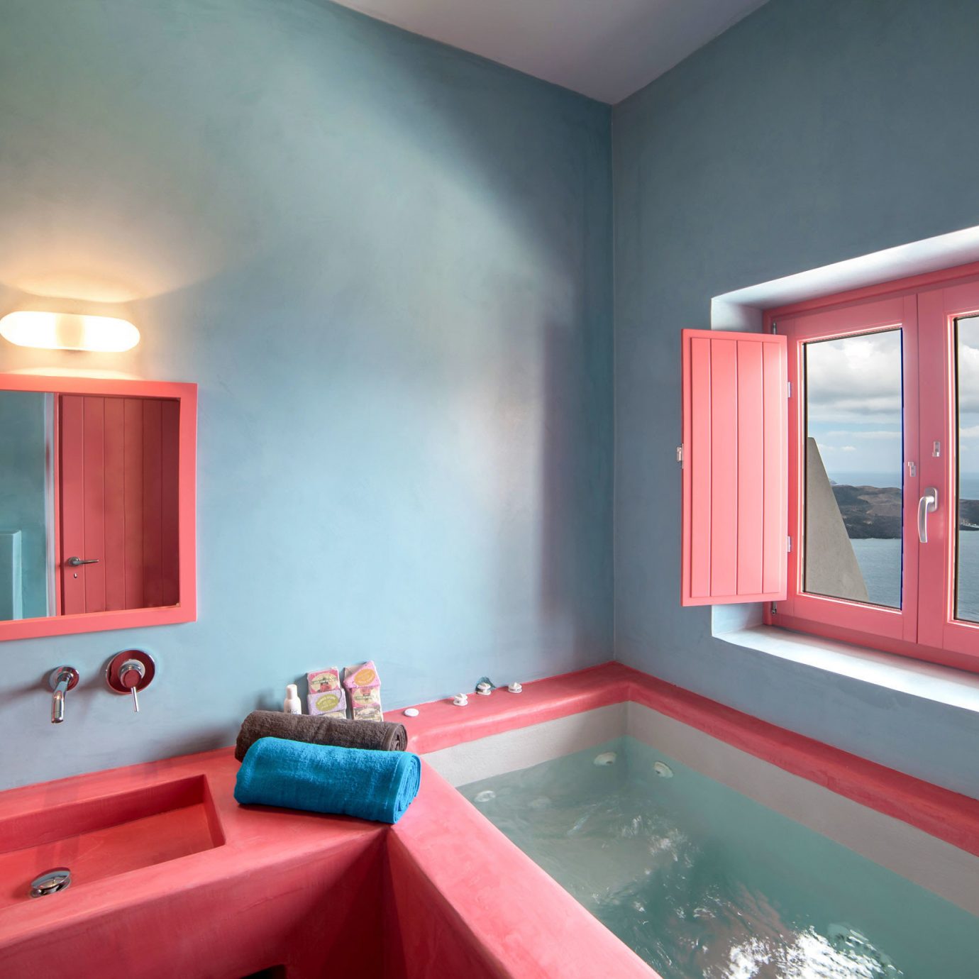Bath Boutique Suite Waterfront bathroom sink red property pink house painted swimming pool bright home Bedroom living room light cottage colored
