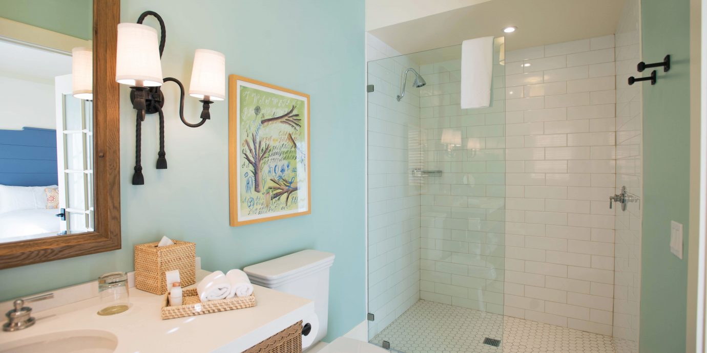 Bath Boutique Natural wonders Romance Wellness bathroom sink mirror property home toilet Suite plumbing fixture tub tile