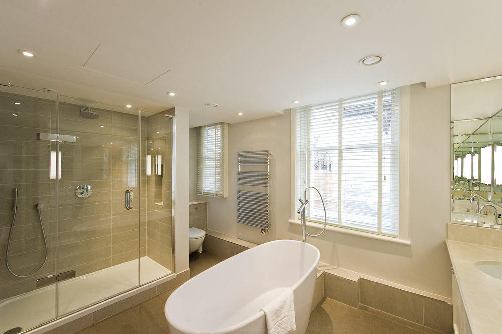 bathroom property home tub bathtub Modern clean Bath tiled