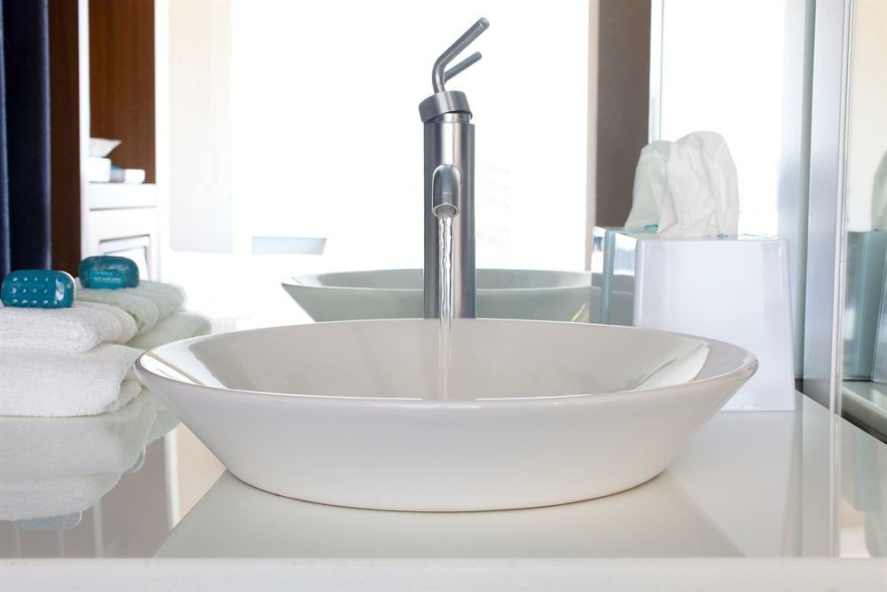 bathtub bathroom sink plumbing fixture bidet tap swimming pool ceramic flooring tub water basin