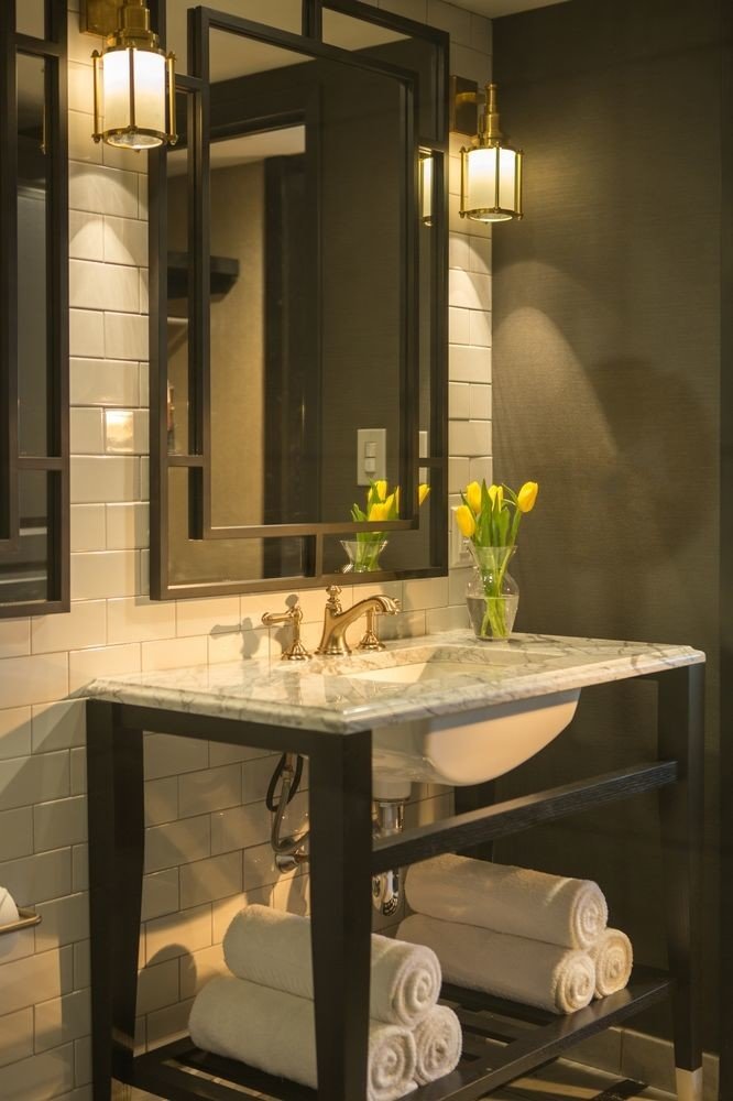 bathroom mirror sink cabinetry lighting home plumbing fixture public towel glass toilet