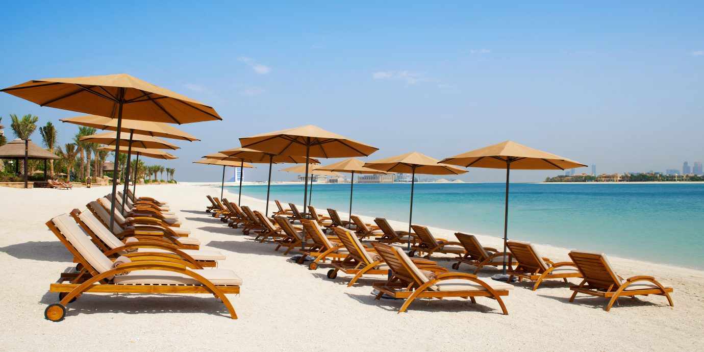 Beach City Family Modern Resort Spa Waterfront umbrella chair sky leisure lawn shore Sea Ocean Coast sand lined set day