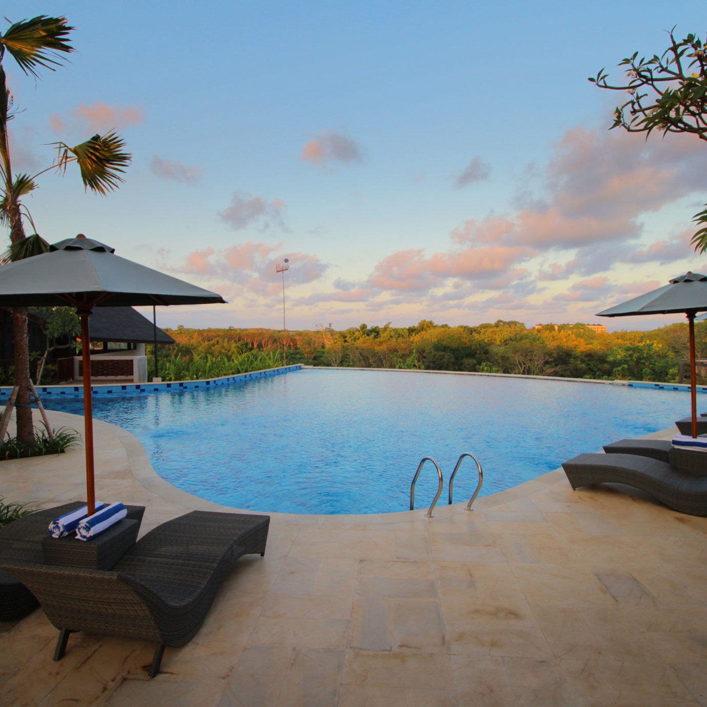 tree sky water property swimming pool Resort palm Beach Villa Sea shore Lagoon lined Deck shade sandy