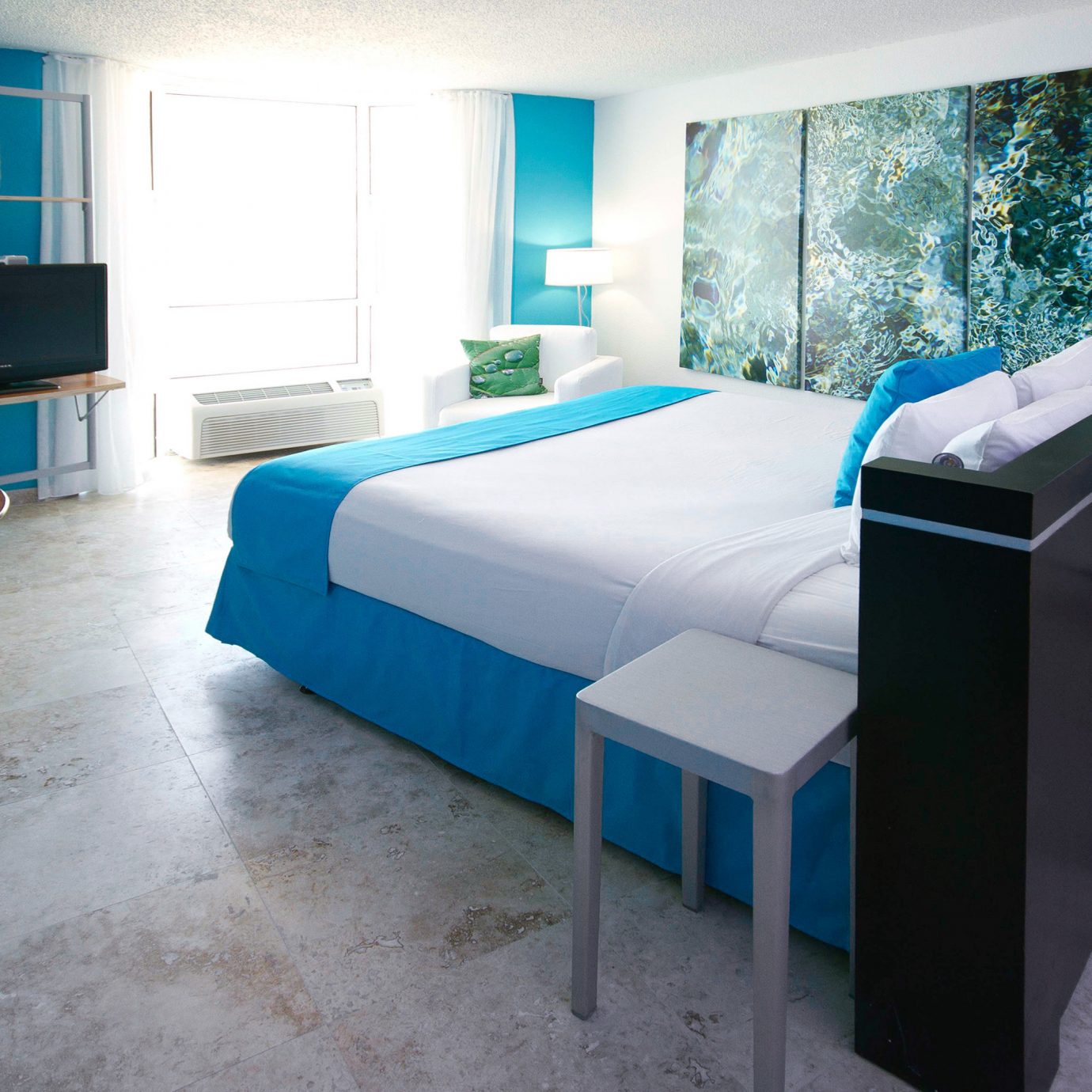 Beachfront Bedroom Boutique Budget City Island Modern property swimming pool blue Suite