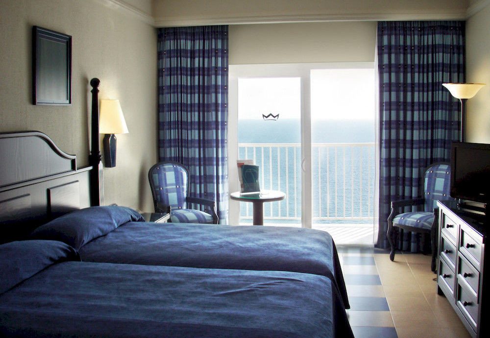 Beachfront Bedroom Resort property living room scene condominium home Suite curtain textile window treatment