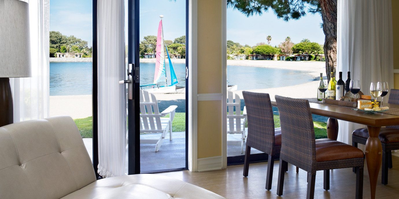 Beachfront Boat Ocean Patio Resort Terrace property home living room condominium cottage porch Villa Suite