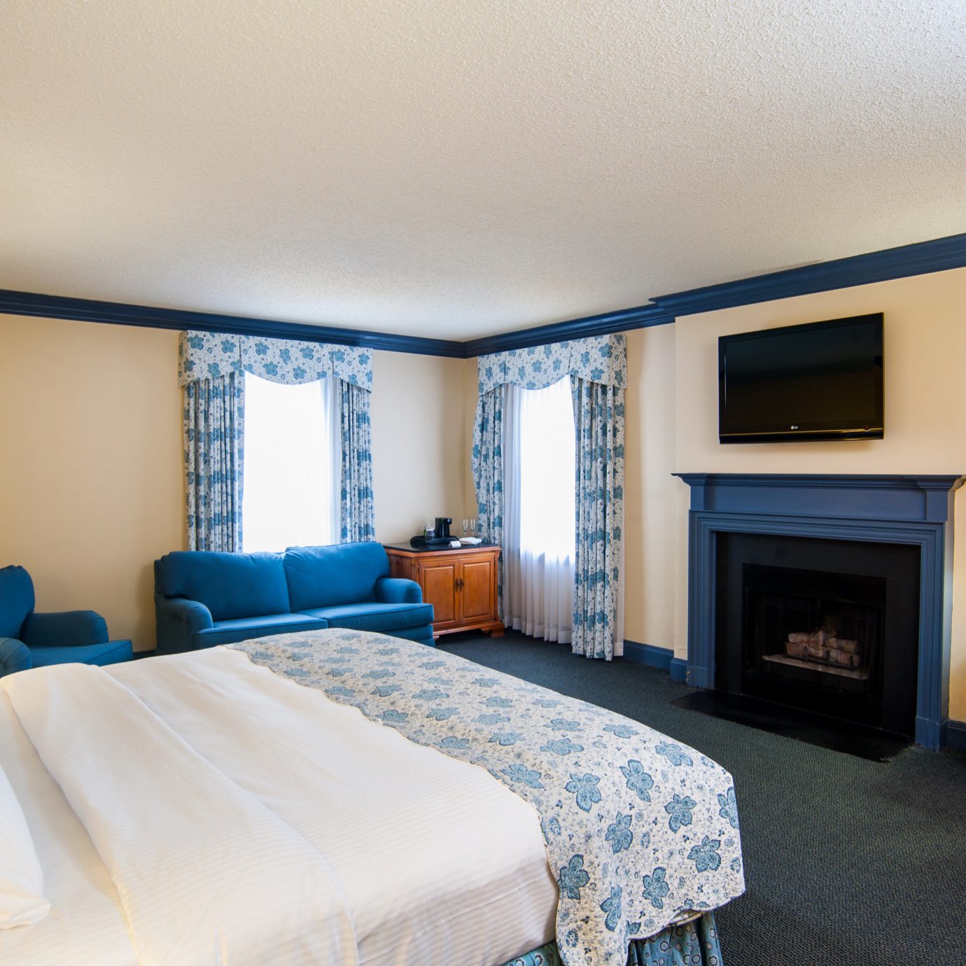 Bedroom Fireplace Inn Resort Trip Ideas property scene Suite yellow cottage Villa