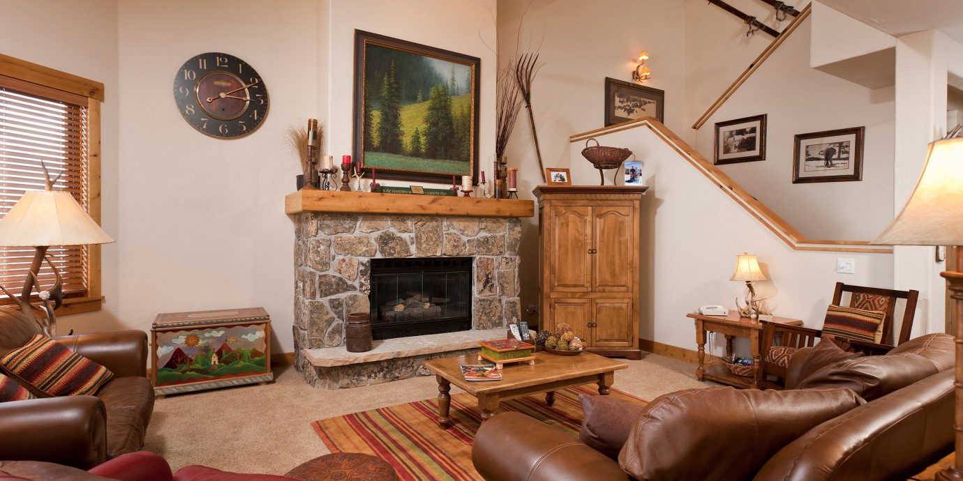 Fireplace Lounge sofa living room property leather chair home cottage Bedroom hardwood farmhouse Villa Suite flat