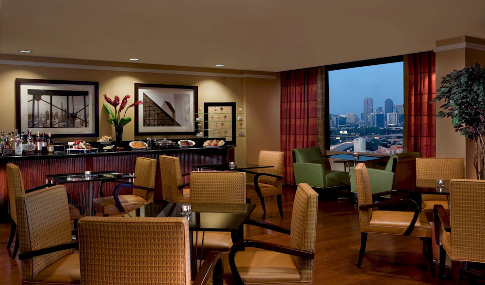 chair property Suite living room restaurant Lobby condominium Resort Bedroom