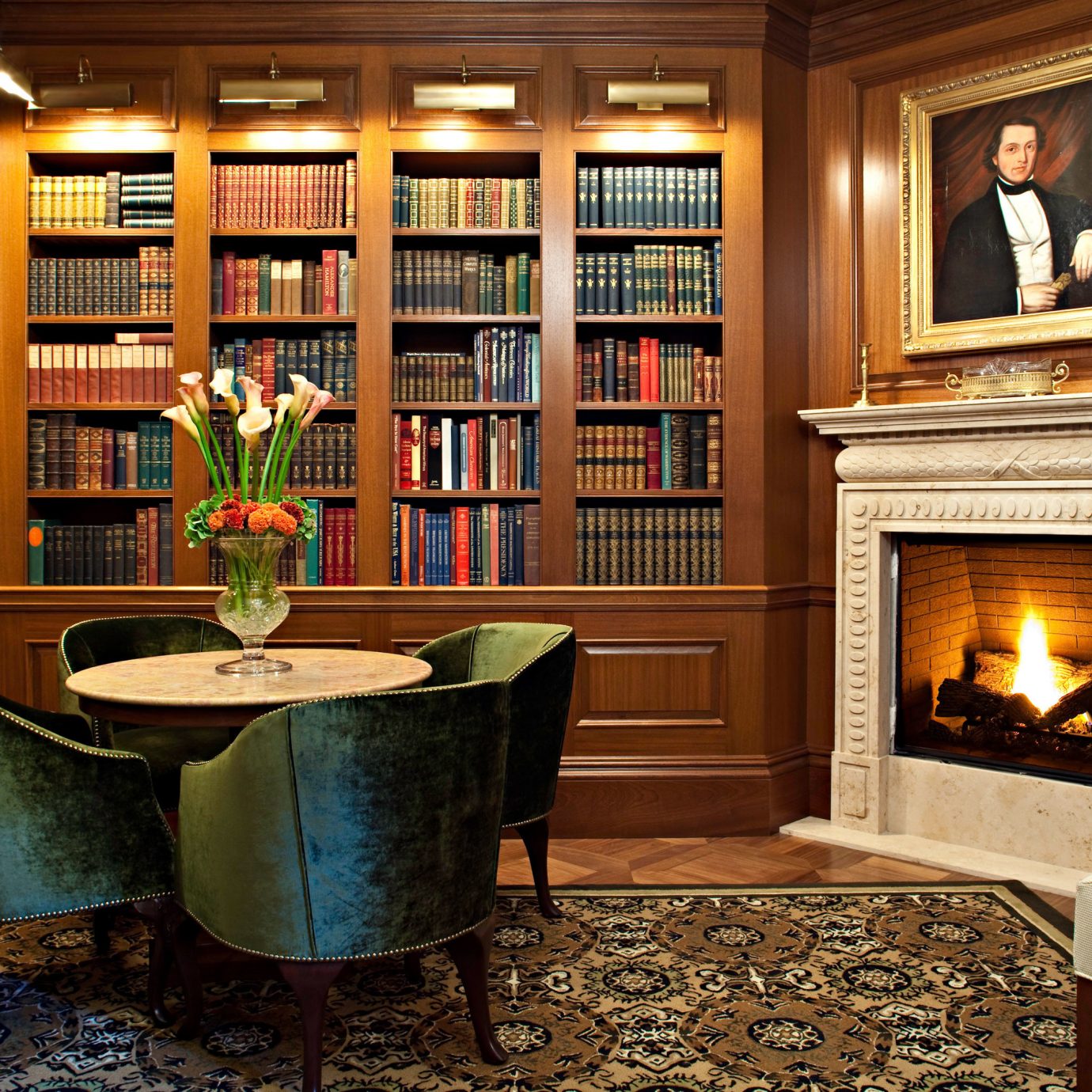 Boutique Hotels Fireplace Hotels Lounge chair home living room cabinetry shelf hardwood mansion