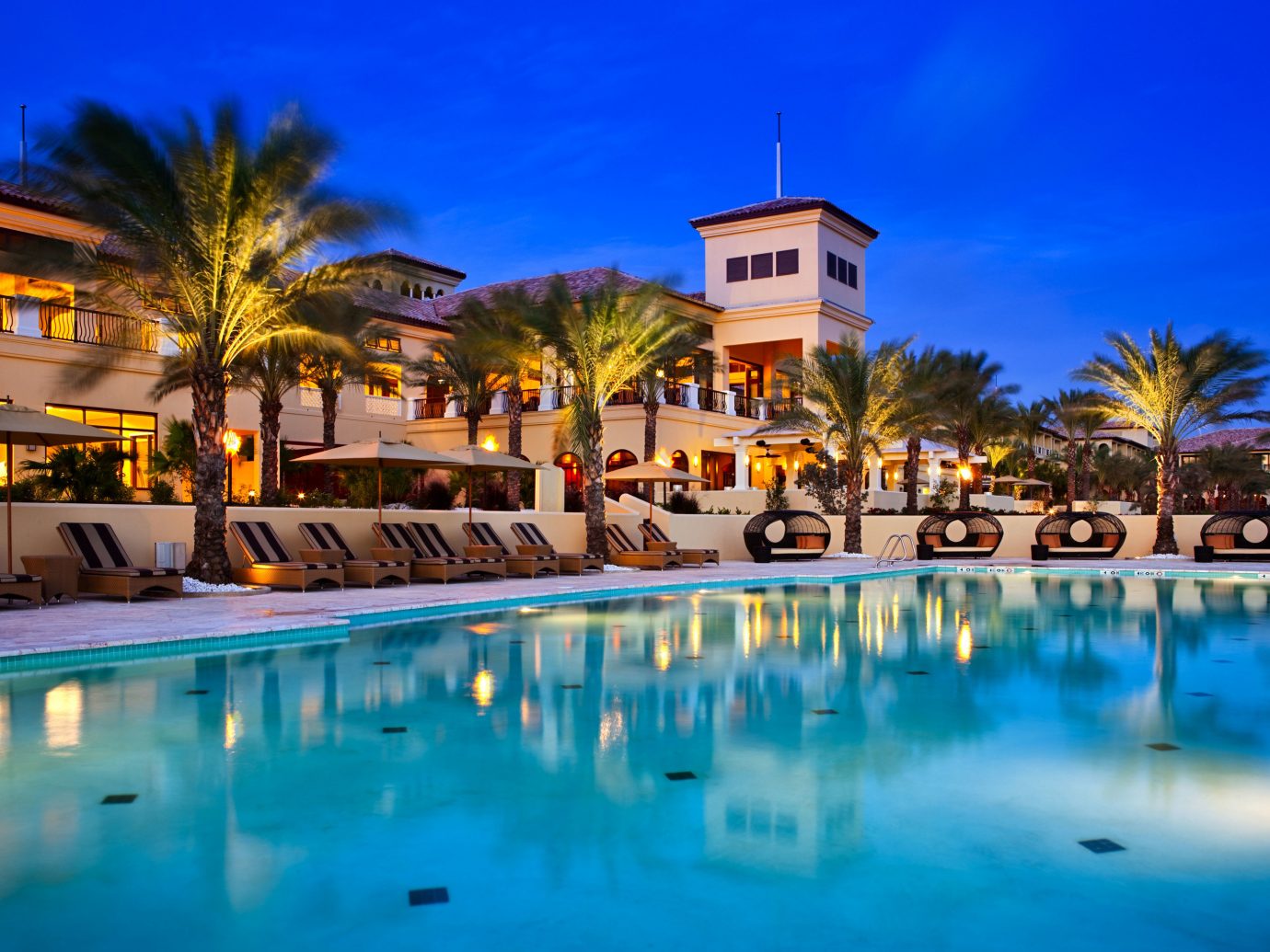 All-Inclusive Resorts Hotels Trip Ideas sky outdoor Resort water leisure reflection swimming pool resort town palm tree arecales vacation hotel real estate estate tourism evening tropics Harbor Villa home caribbean tree computer wallpaper lined