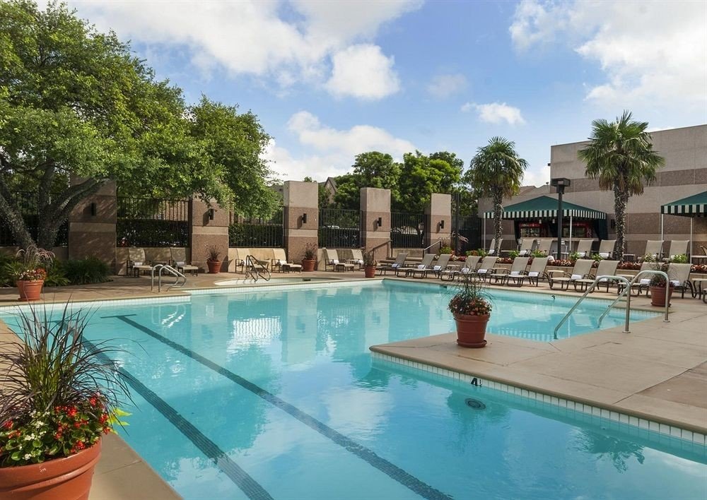 Classic Pool tree swimming pool property Resort leisure Villa condominium resort town backyard plant