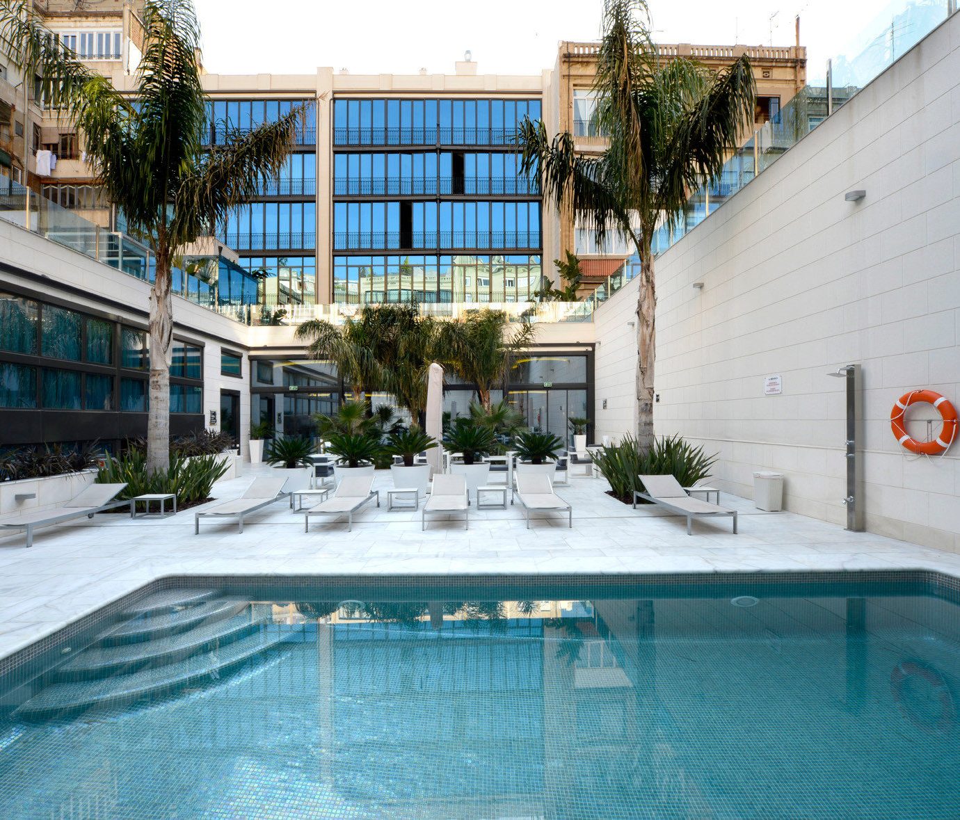 building swimming pool property condominium Courtyard backyard home Resort Villa mansion blue
