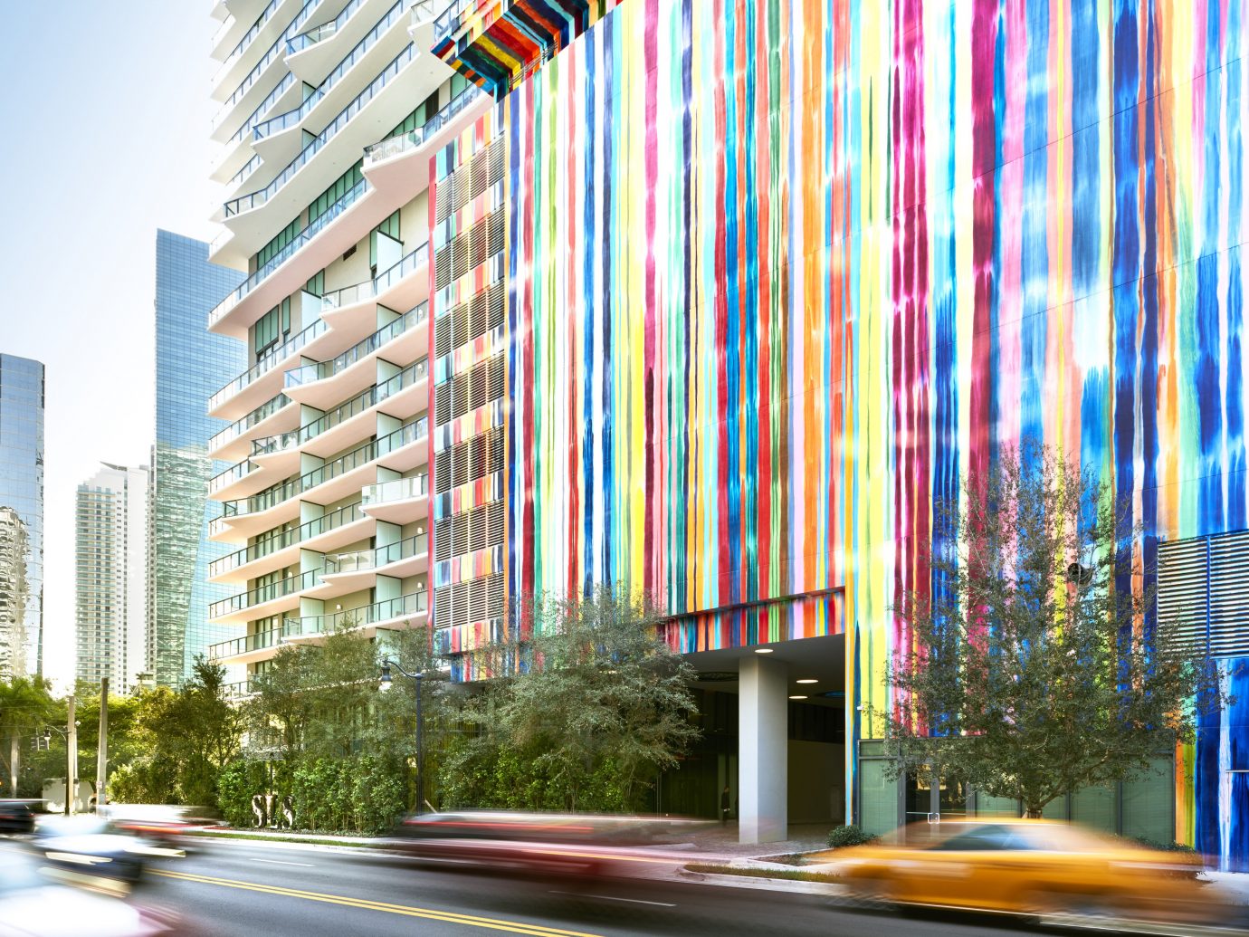 Hotels outdoor urban area Architecture interior design facade Downtown condominium lighting City skyscraper tower block window covering colorful lined tall
