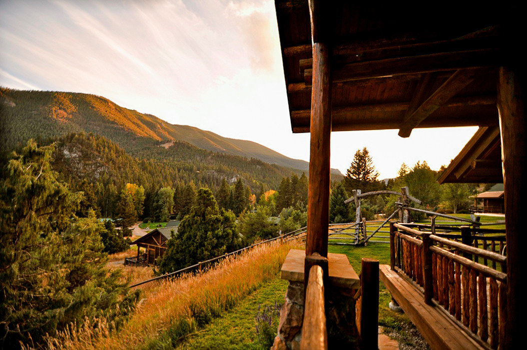 Glamping Hotels Montana Outdoors + Adventure Trip Ideas Nature sky tree wilderness plant mountain morning landscape sunlight hill cloud rural area evening wood grass national park house