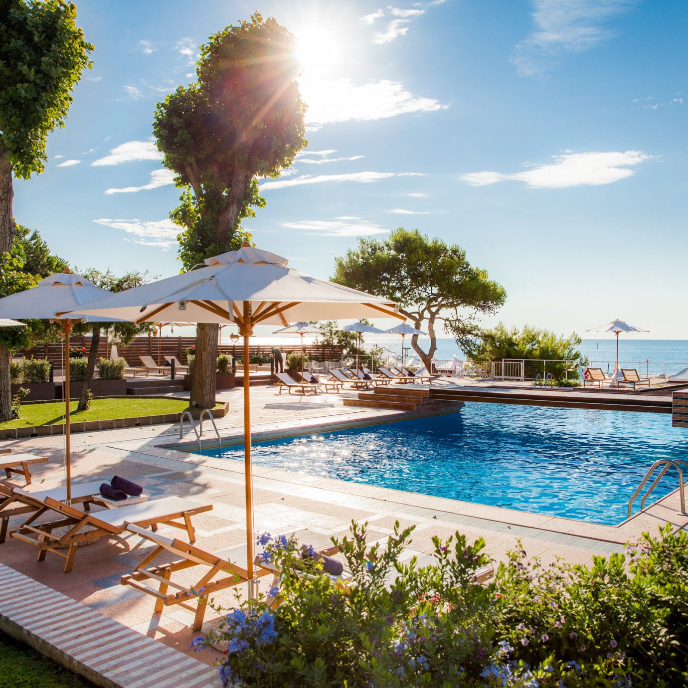 tree sky water swimming pool leisure property Resort Villa backyard condominium mansion shore Deck