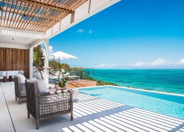 chair swimming pool property caribbean leisure Resort Deck Villa condominium cottage shore