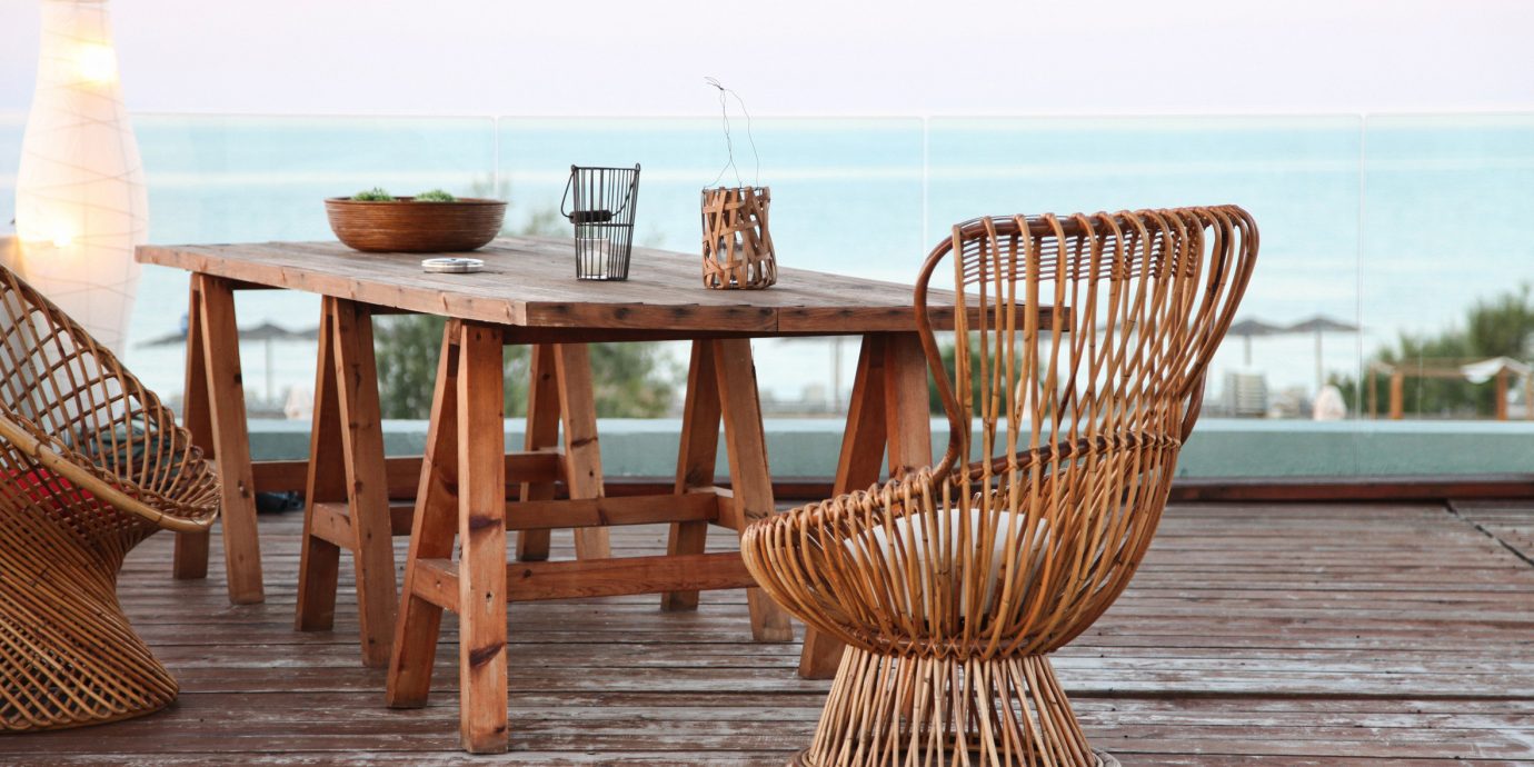 Dining Drink Eat Outdoors Patio Resort Scenic views chair wooden hardwood wicker living room outdoor structure