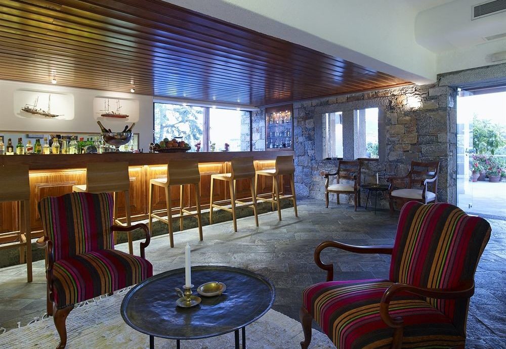 chair property Resort Lobby living room Dining home Villa condominium recreation room mansion restaurant