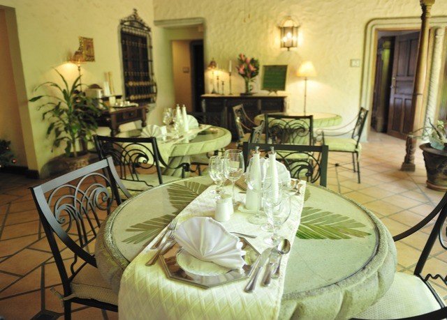 property restaurant home cottage Dining Villa Suite mansion Resort living room dining table