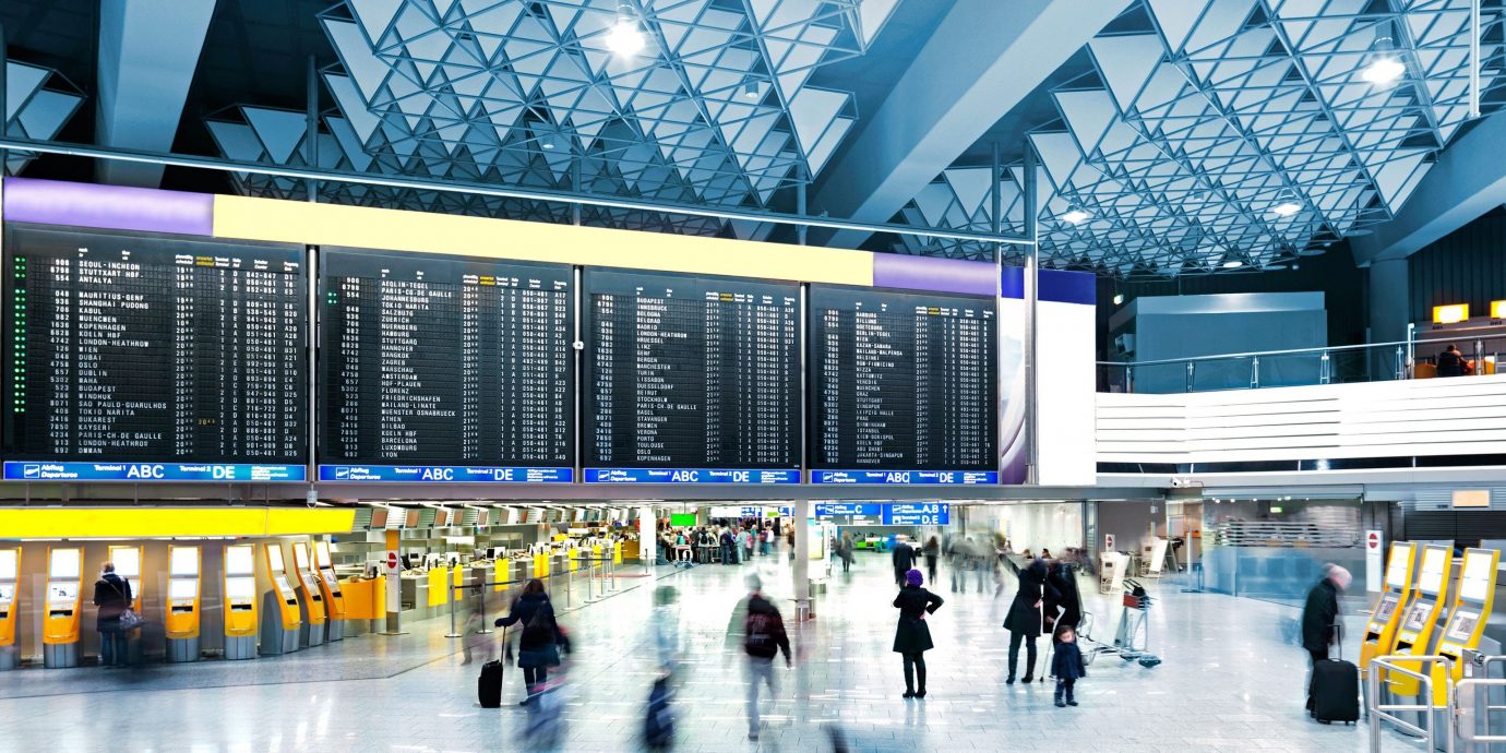 Travel Tips indoor transport airport terminal building shopping mall ceiling ice rink public transport convention center airport arena retail headquarters