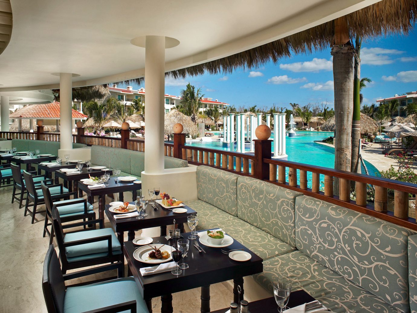 All-inclusive Balcony Dining Drink Eat Family Hotels Patio Pool Resort Terrace table chair floor leisure property indoor restaurant ceiling vacation estate condominium interior design area furniture several