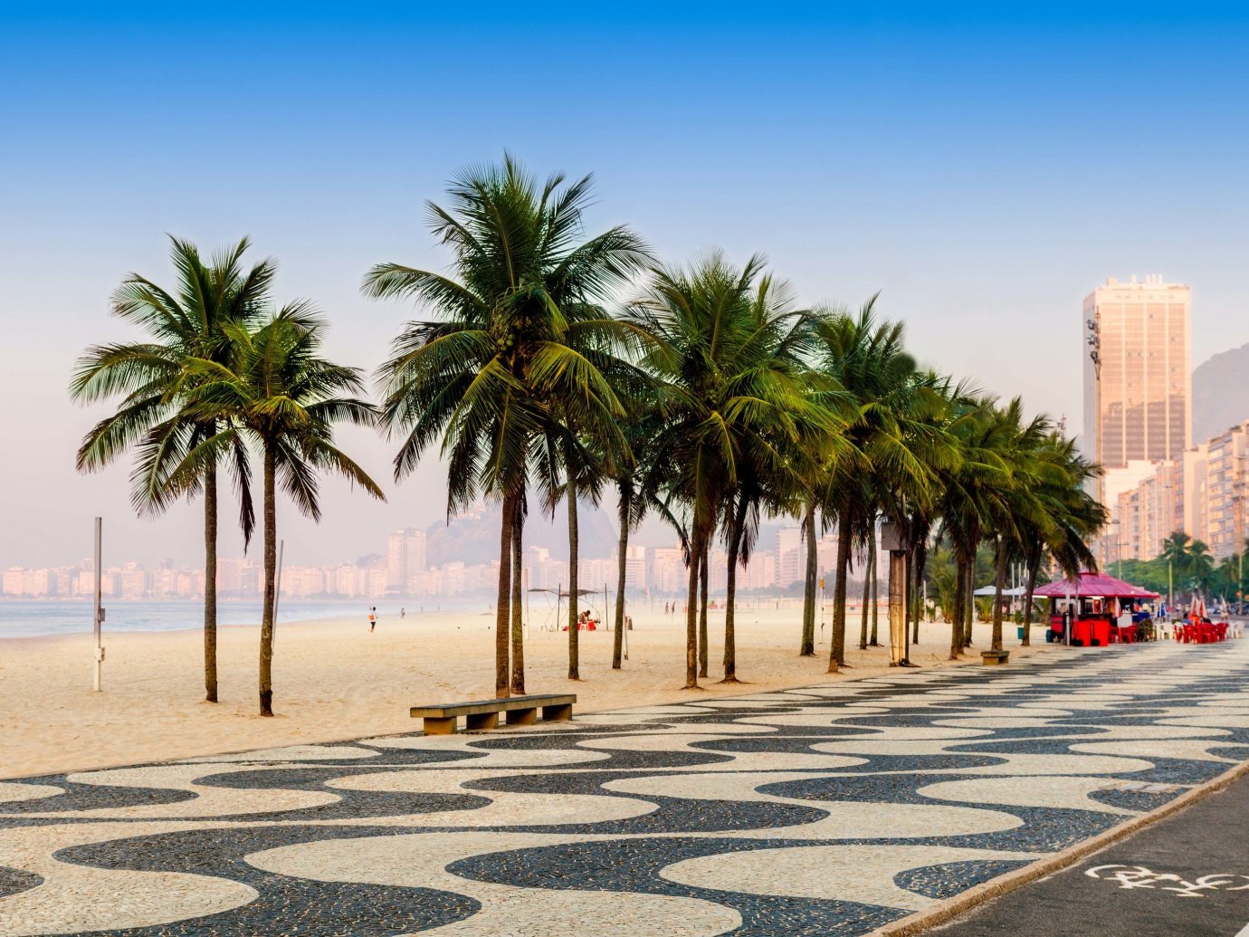 Travel Tips sky outdoor tree palm palm tree arecales plant Sea shore scene City Beach daytime road date palm Coast vacation sand water tourism walkway lined sandy day