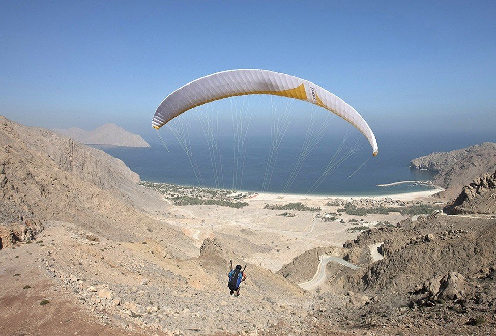 Hotels sky outdoor paragliding ground air sports sports windsports Nature mountain extreme sport Adventure gliding parachuting day